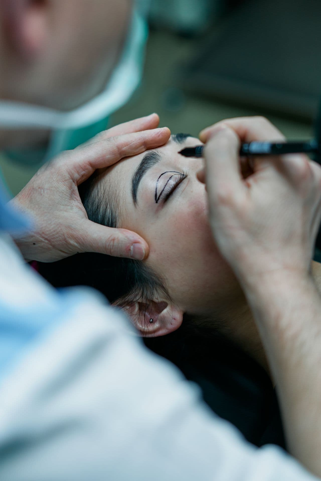Clinician marking a patient before a procedure
