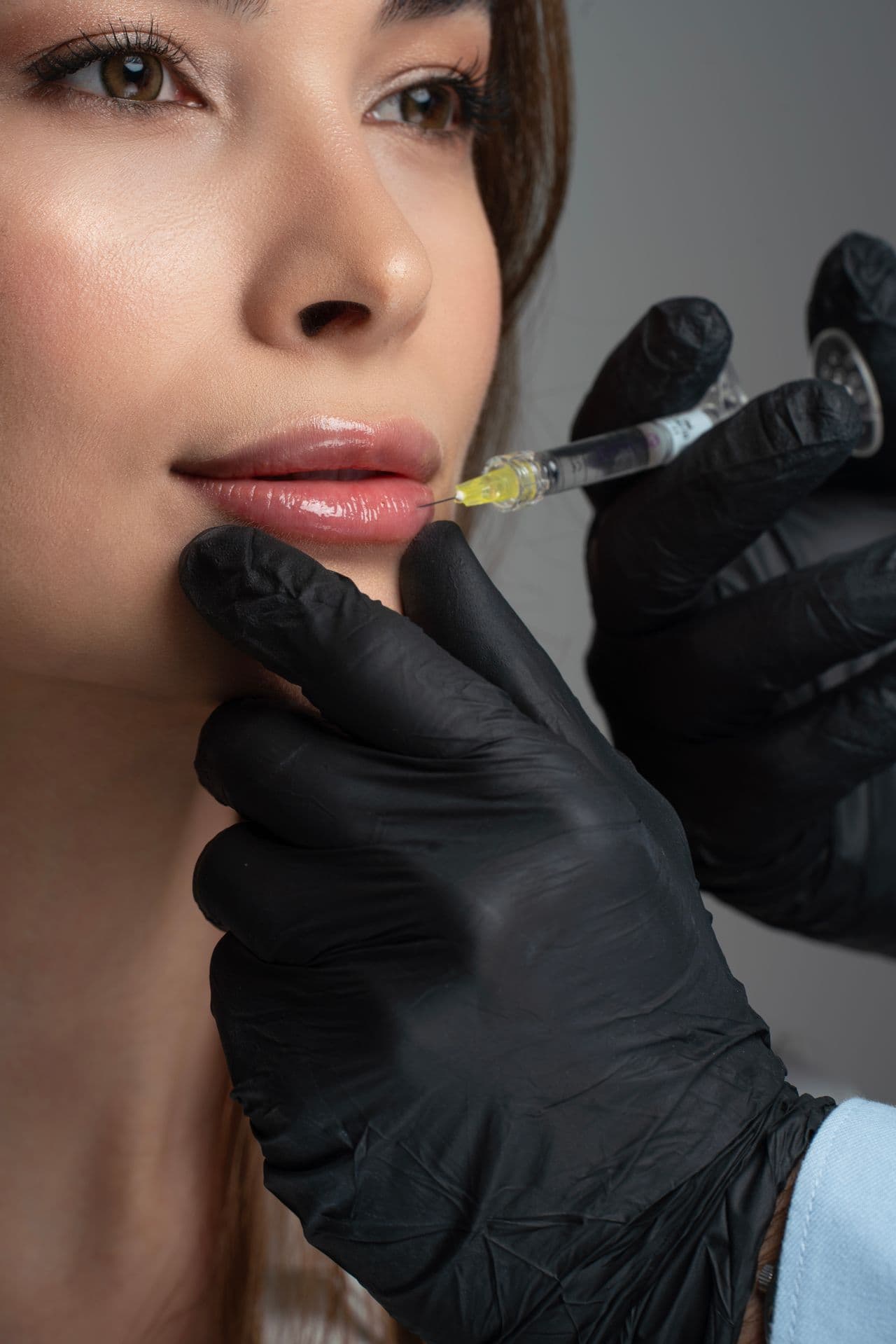 Close-up of an injectable procedure being administered
